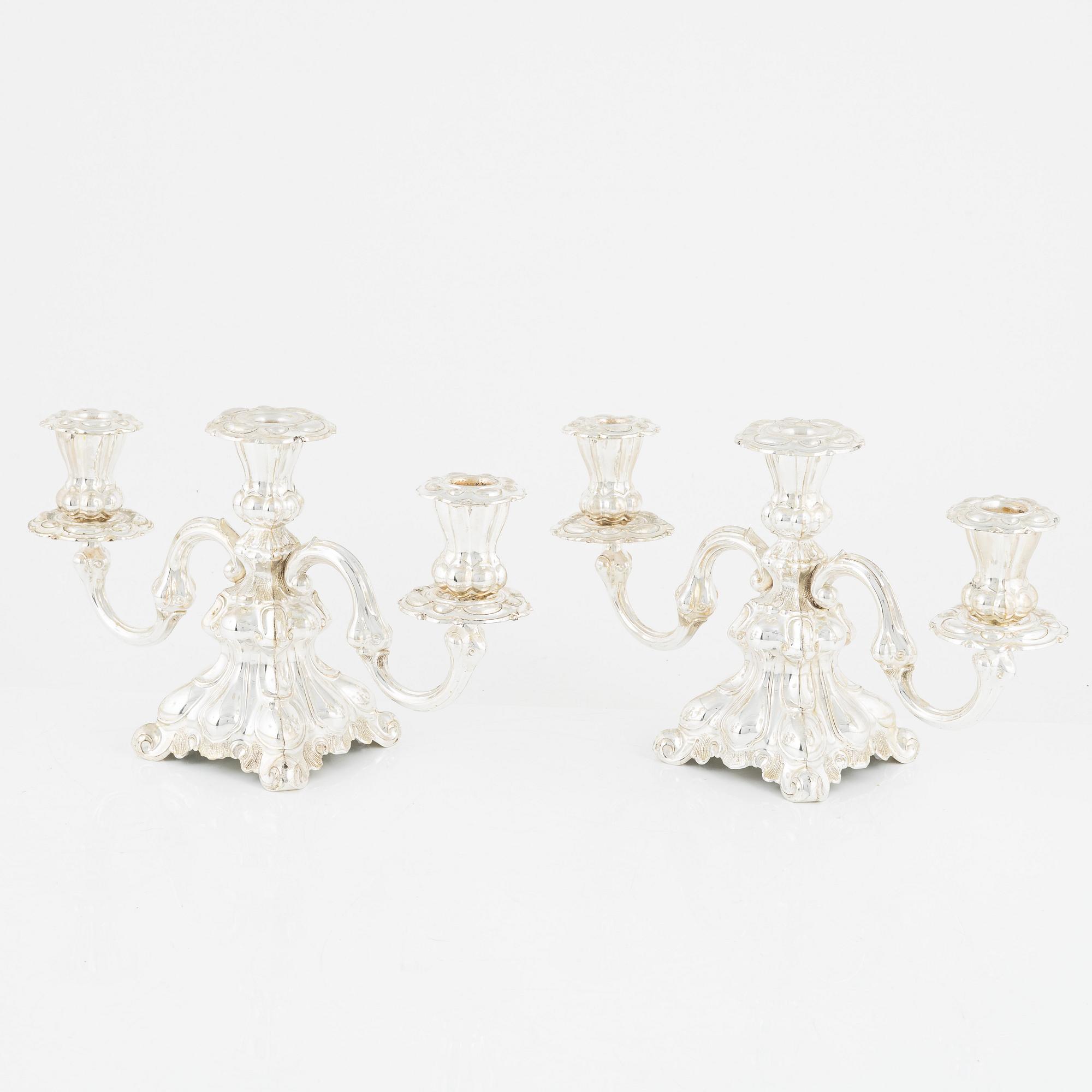 A pair of Baroque style candelabras, early 20th Century.