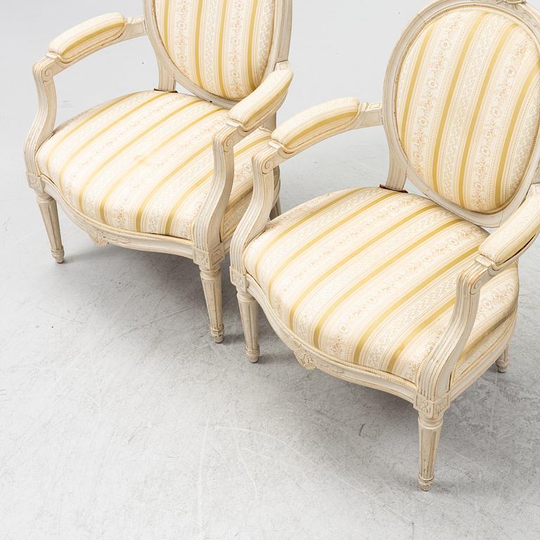 A pair of Gustavian style armchairs signed J.G.A, mid 20th century.