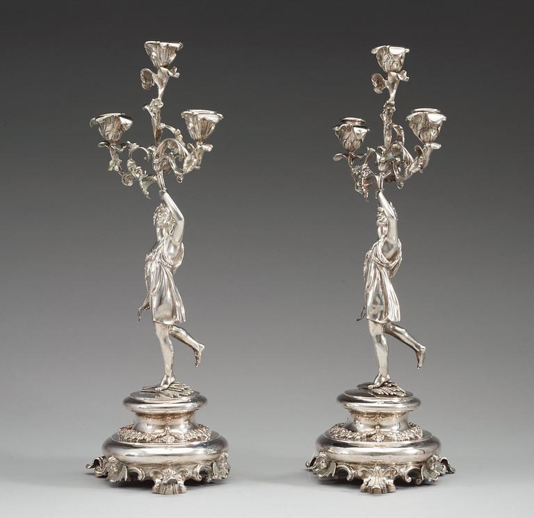 A pair of Swedish 19th century silver candelabra, makers mark of Gustaf Möllenborg, Stockholm 1864.