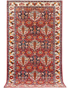 A Hamadan carpet, a. 335 x 184 cm.