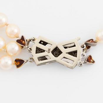 Cultured pearl necklace, clasp 18K white gold.