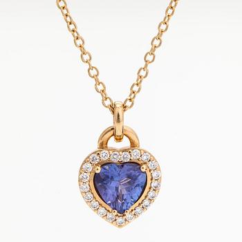 An 18K gold necklace, with a heart-shaped tanzanite and brilliant-cut diamonds.