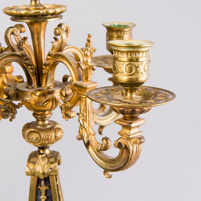 A pair of bronze candelabra from the latter half of the 19th Century.