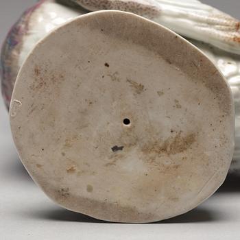 A porcelain figure of a dove, possibly Samson.