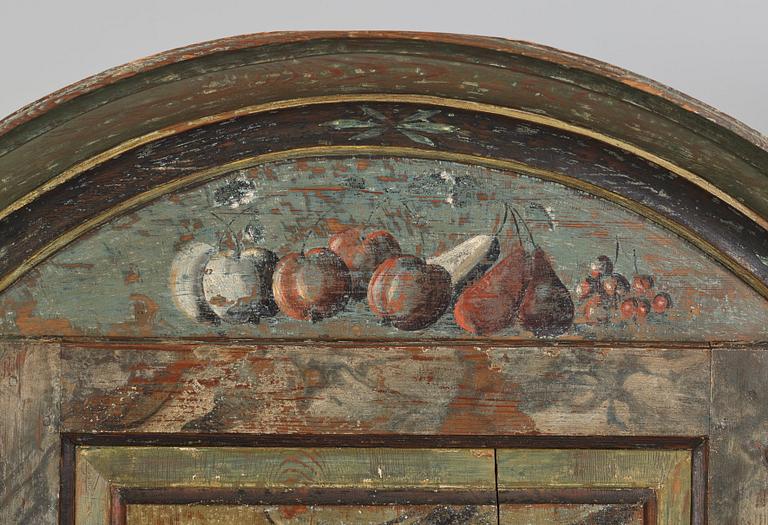 A Swedish polychrome-painted corner cabinet attributed to J. Bäckström (1773-1837).