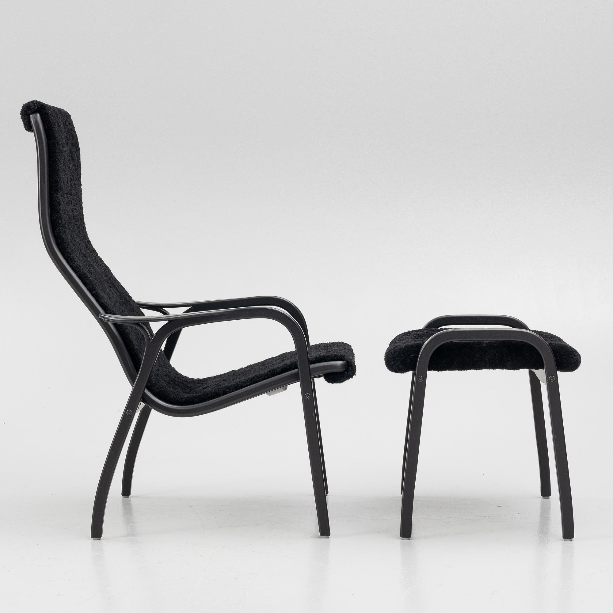 Yngve Ekström, a 'Lamino' easy chair with footstool, Swedese, 2018.