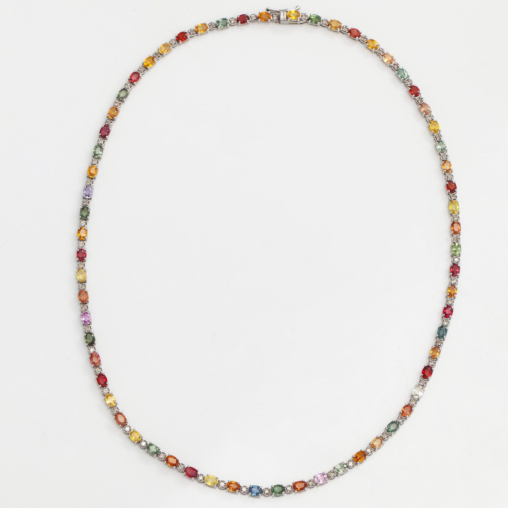 An 18K white gold necklace with multi-coloured sapphires and diamonds.