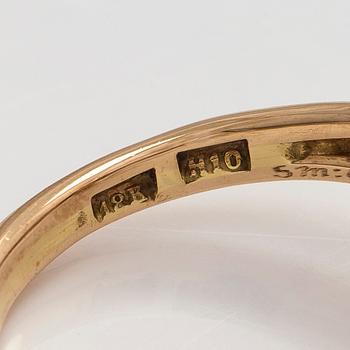 Ring, faceted emerald, brilliant cut diamonds, 18K gold, Stockholm 1982.