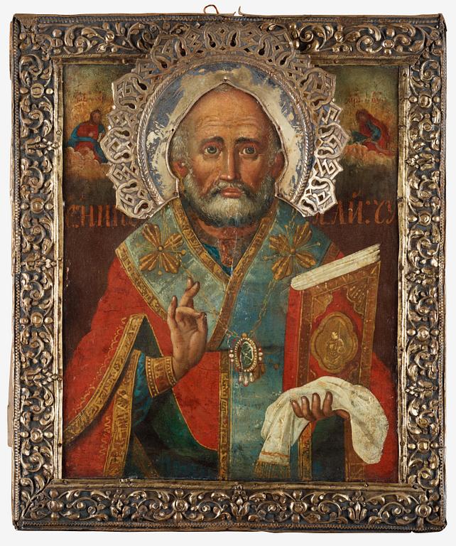 A Russian 19th century silver-gilt icon of St. Nicolaus.