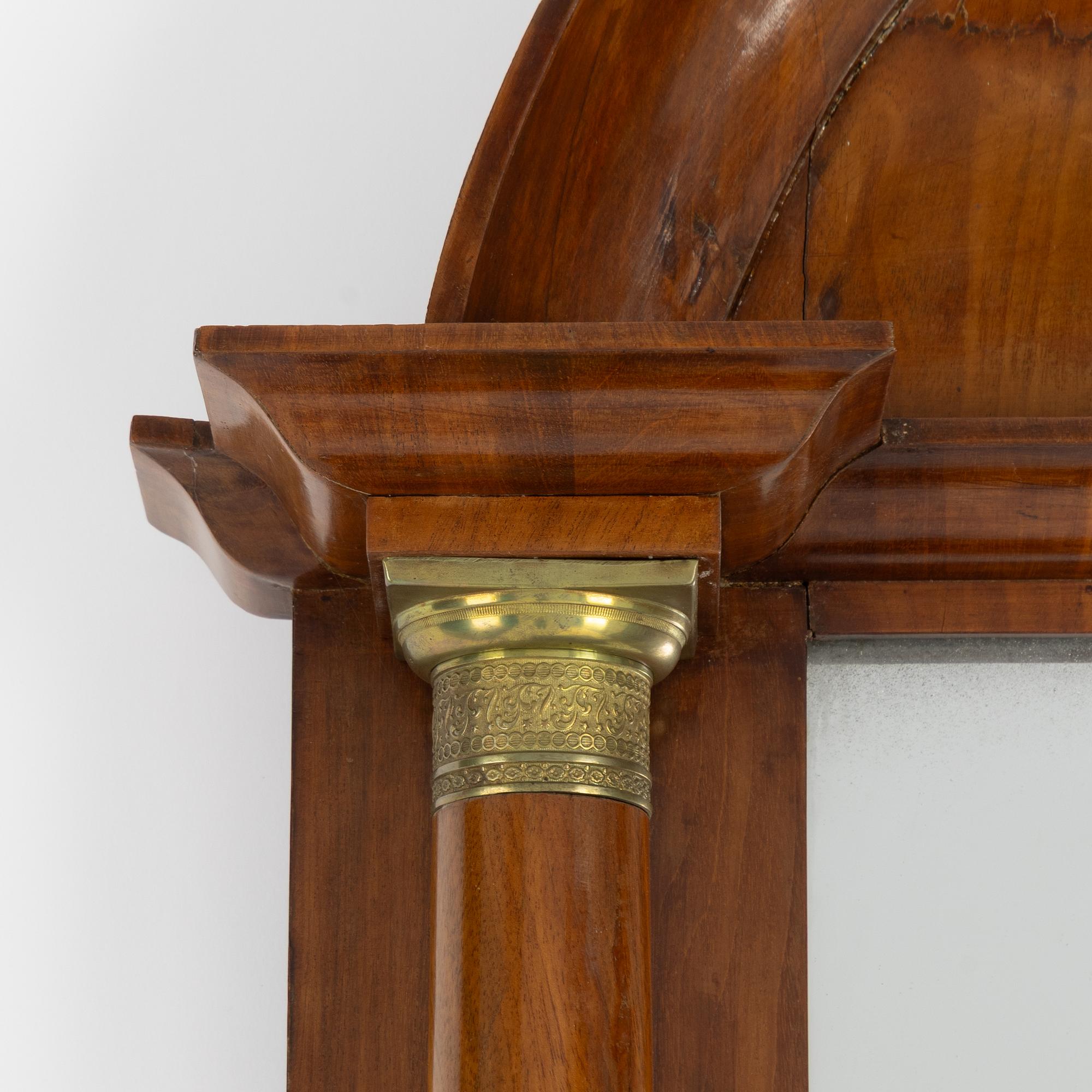 An Empire mirror and console table, first half of the 19th century..