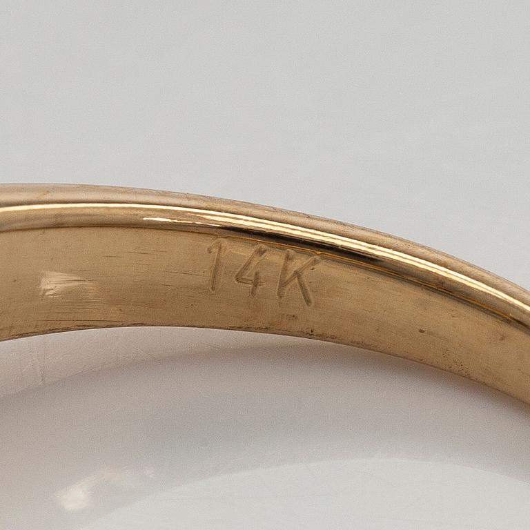 Sormus, markiisihiottu timantti, briljanttihiotut timantit, 14K kultaa.
