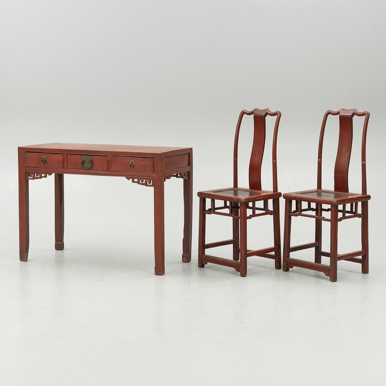 A Chinese desks and two 'Yoke-back' chairs, 20th Century.