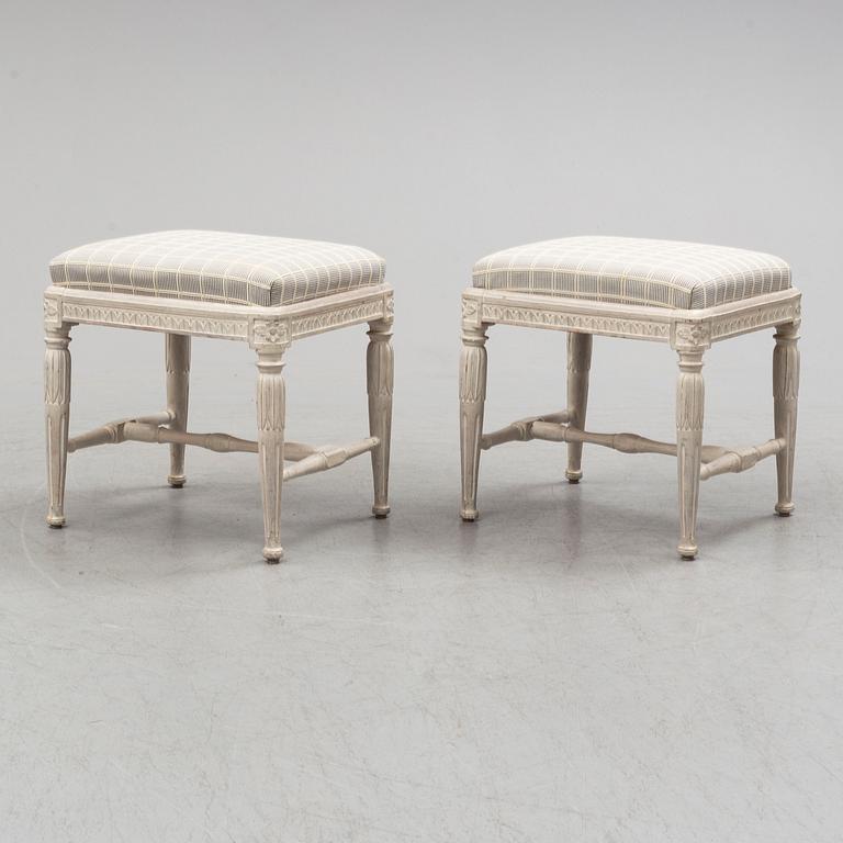 A pair of gustavian late 18th century stools by Erik Öhrmark (master in Stockholm 1777-1813).