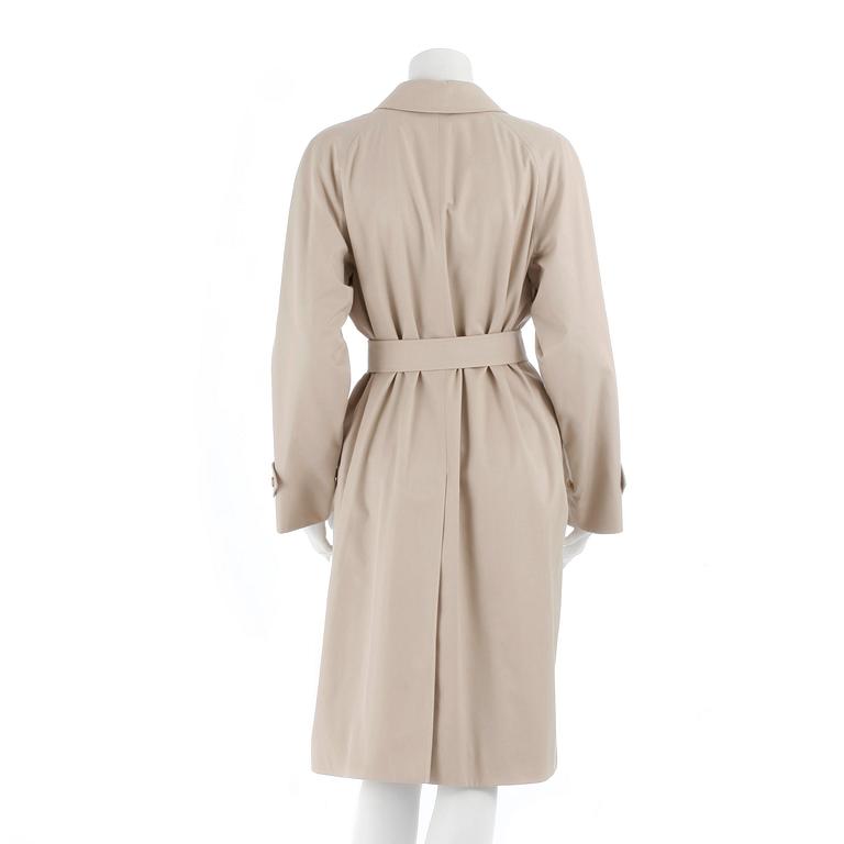 BURBERRY, a beige cotton blend trench coat and a shawl.