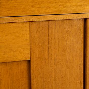 Josef Frank, two mahogany veneered bokkshelves, model 2112, Firma Svenskt Tenn, Sweden.