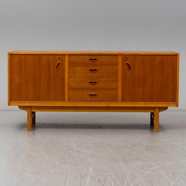 A 1950/60s teak veneered sideboard.