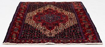 A Senneh rug, a. 159 x 117 cm.