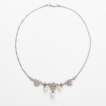 An 18K white gold necklace with cultured pearls and diamonds ca. 0.04 ct in total. Finnis import marks 1963.