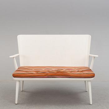 A second half of the 20th century sofa, pair of armchairs and coffee table by Göran Malmvall.