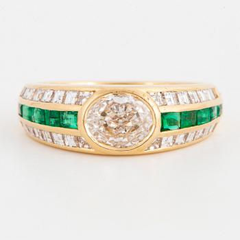 Oval-cut diamond ca 0,80 ct and carré-cut emerald and diamond ring, Fasano Italy.