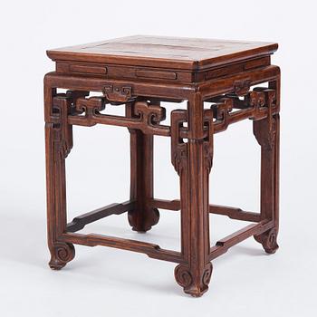 A Chinese hardwood table/seat, Qing dynasty, 19th Century.