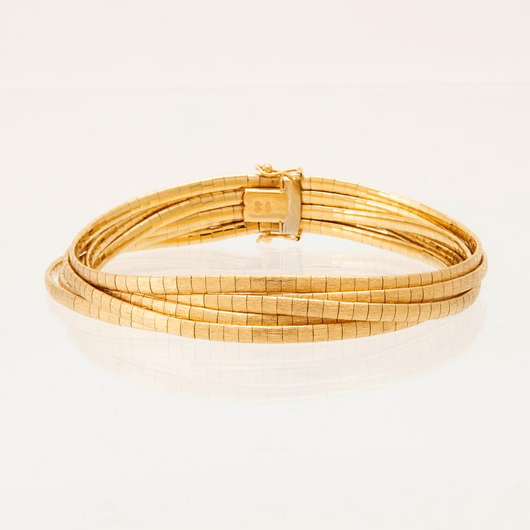 Multi-strand bracelet in 18K gold, Unoaerre Italy.