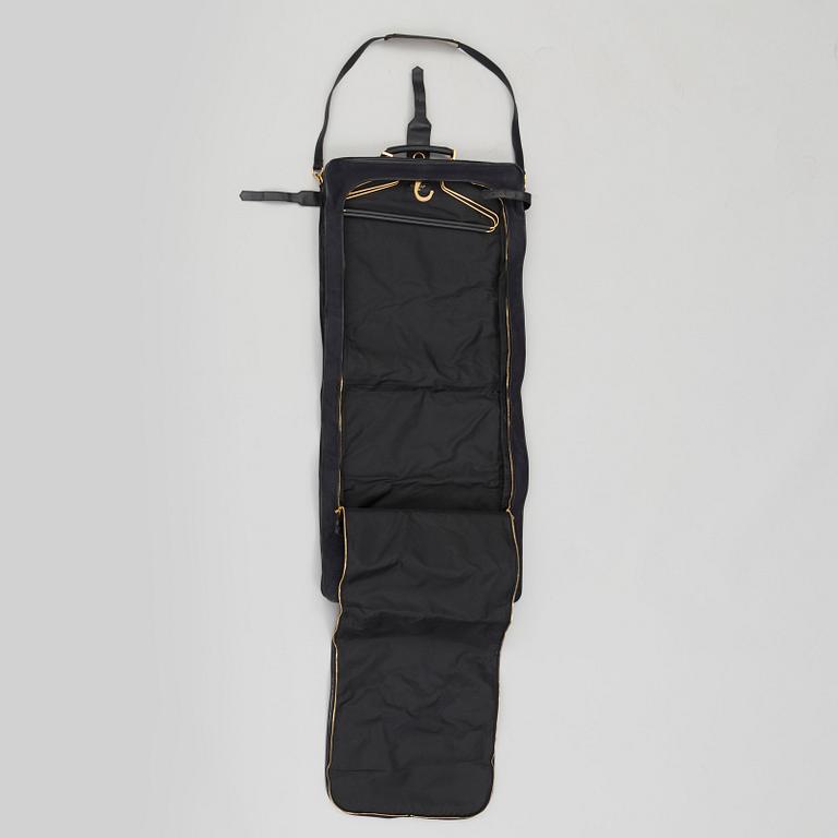 a CHANEL garment bag.