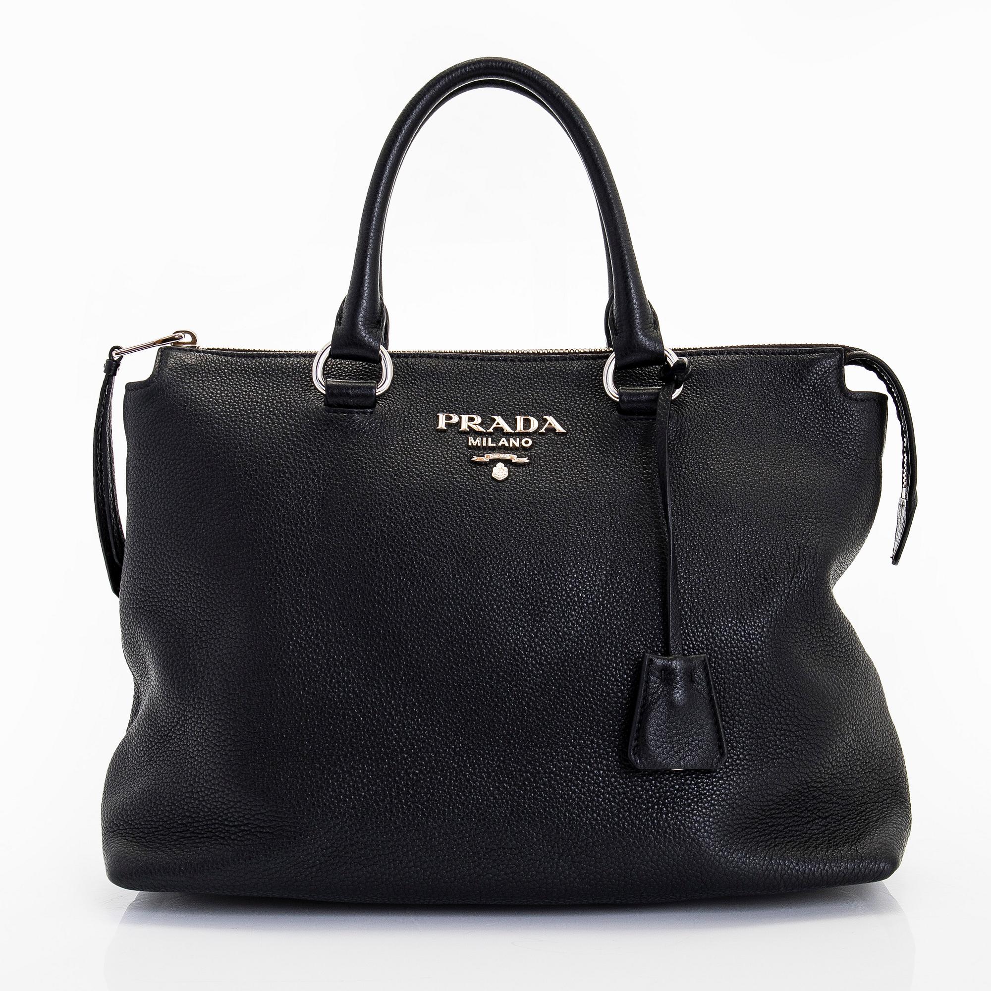 Prada, a leather bag.
