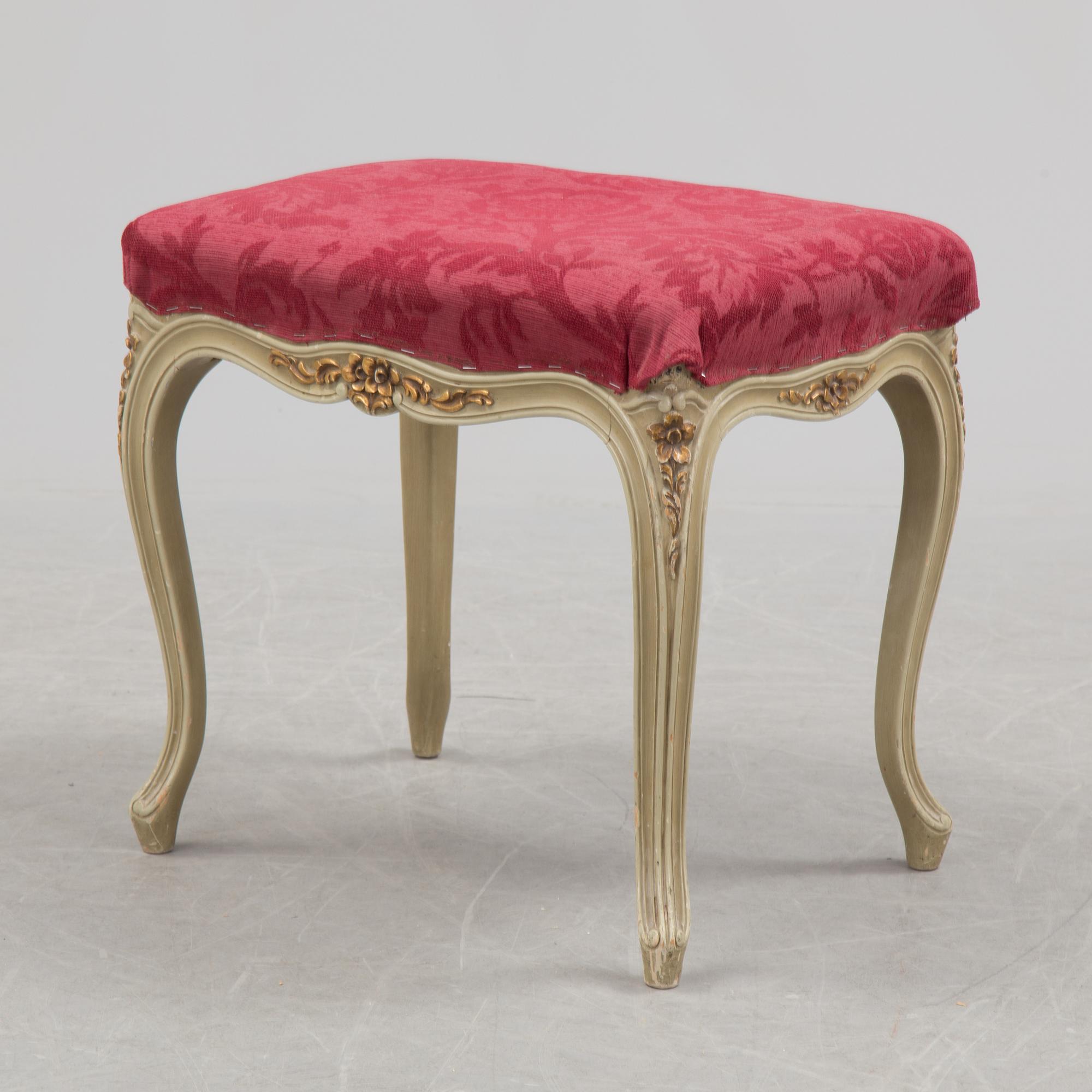 A mid 20th century Rococo style dressing table, a pair of bedside tables and one stool.