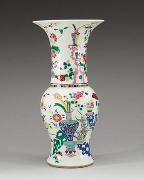 A famille rose vase, Qing dynasty, 19th Century, with Kangxis six character mark.