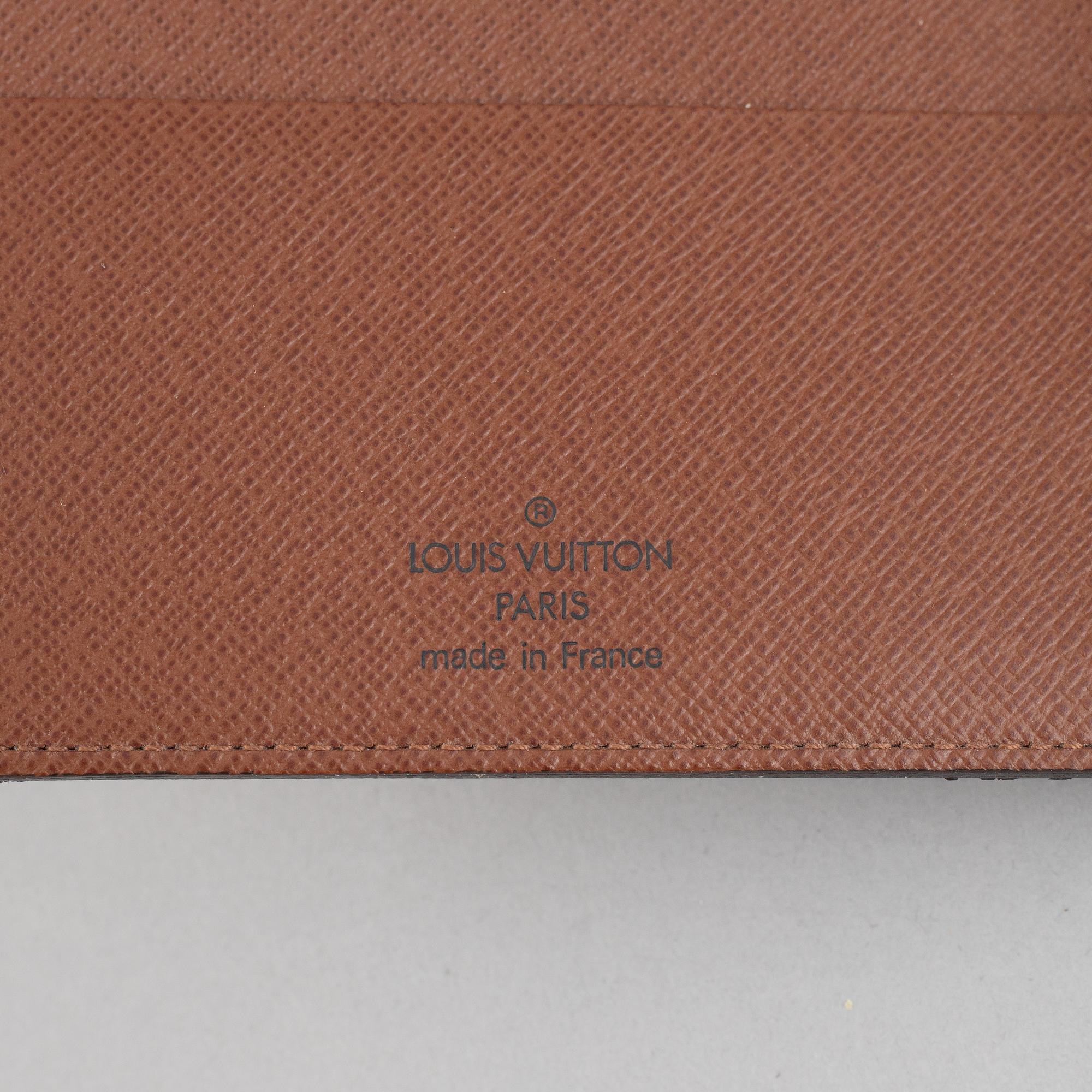 Louis Vuitton, plånbok och kalender.