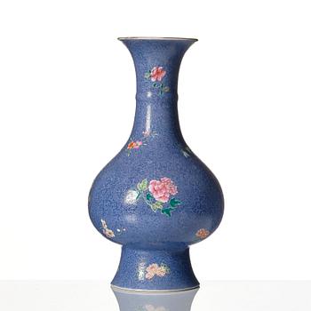 A famille rose sgrafitto vase, Qing dynasty, 19th Century with Qianlong mark.