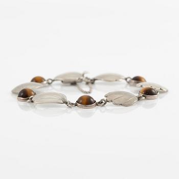 Two bracelets, Victor Janson, silver, one set with tiger's eye.