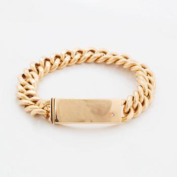 A 14K gold bracelet.