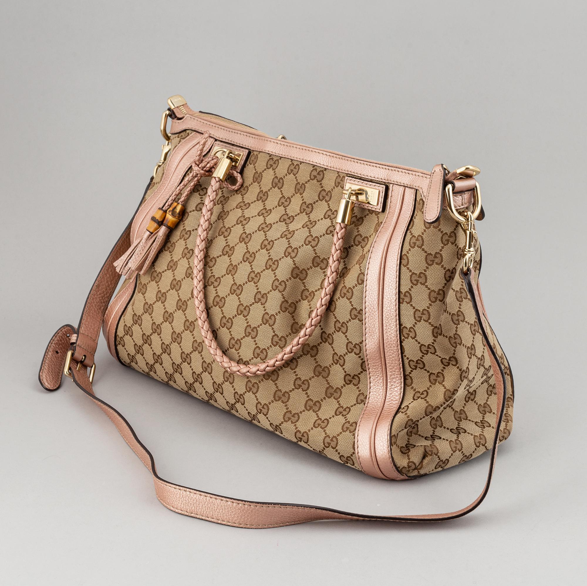 Gucci, a monogram canvas bag.