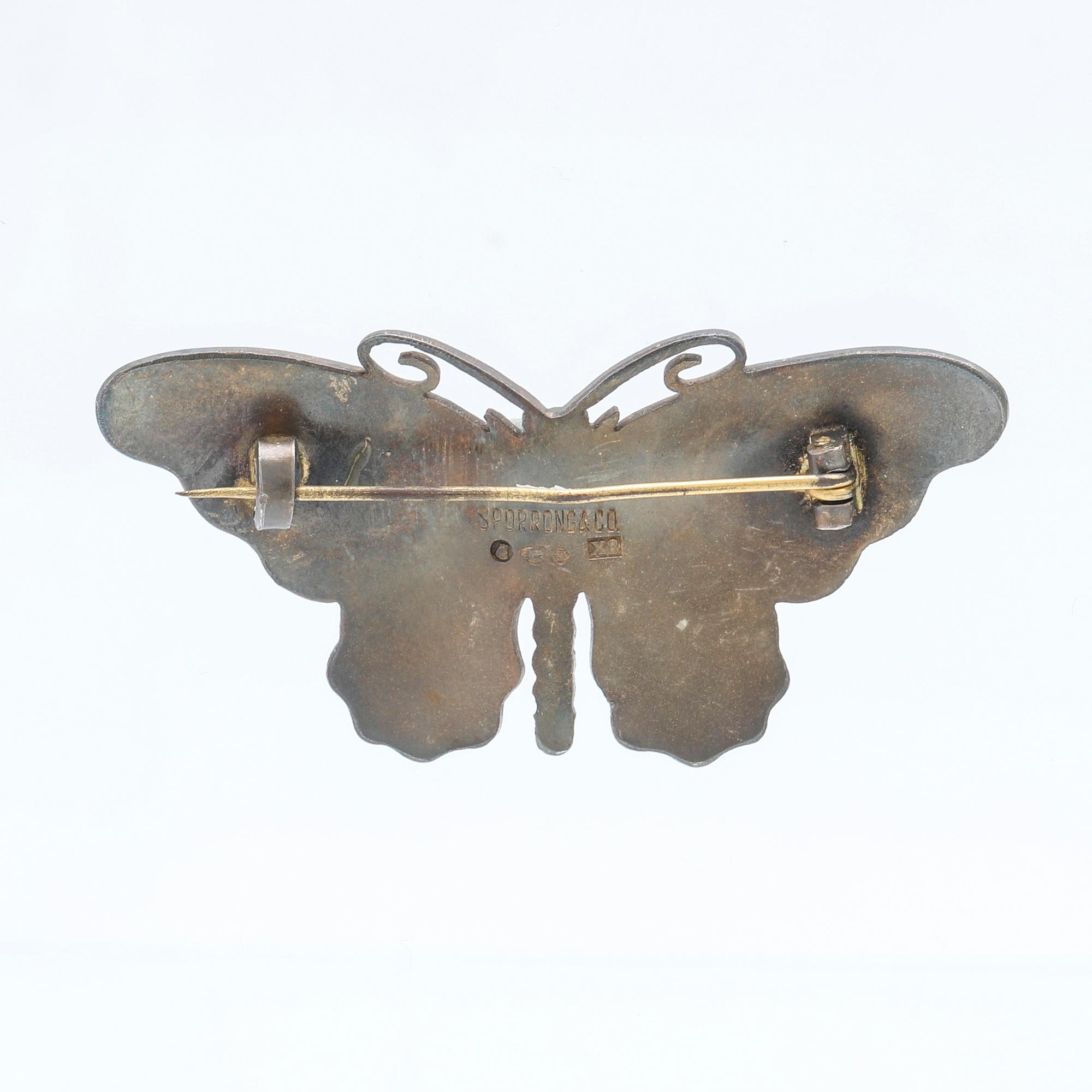 Sporrong, brosch silver och emalj, Stockholm 1948.