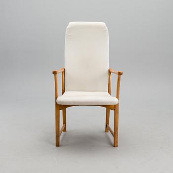 A mid-20th century open arm chair model F-202 for M-H Produkt, Sweden.