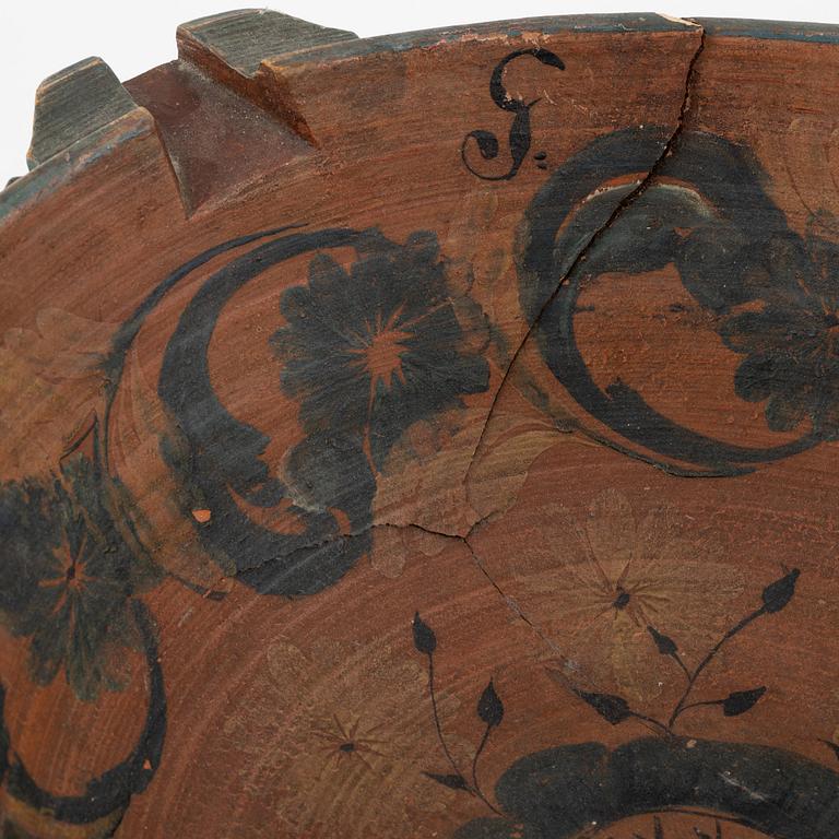 A lathed and painted bowl dated 1783.