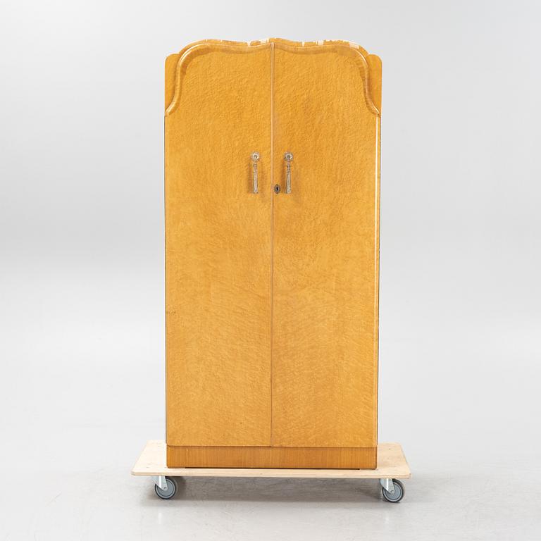 A Durable Suites Ltd birch cabinet, second half of the 20th century.