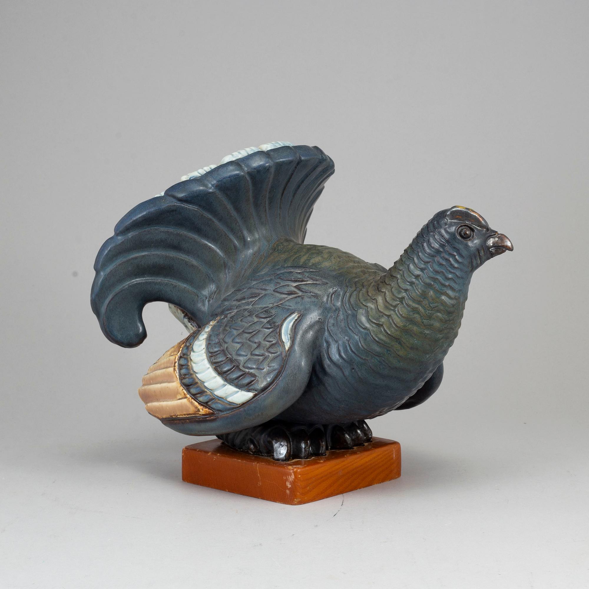 GUNNAR NYLUND, a stoneware sculpture of a grouse, Rörstrand, Sweden.