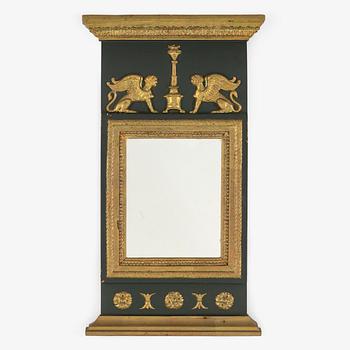 A first half of the 19th century empire mirror.