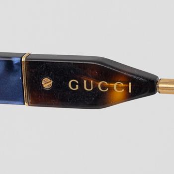 Gucci, solglasögon.