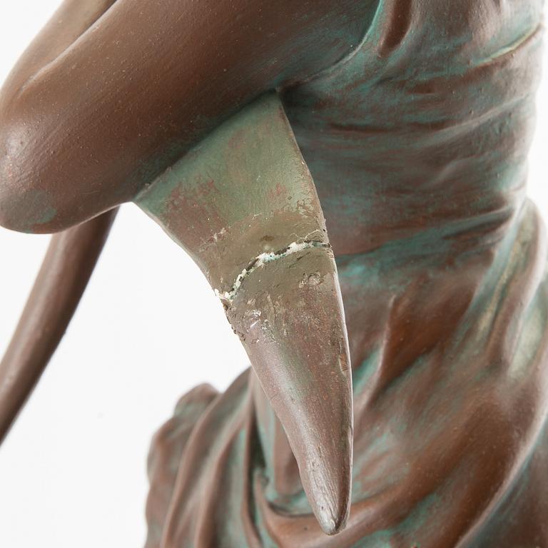 Dekorativ skulptur Kvinna med får och lie 1900-talets första hälft.