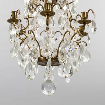 A ROCOCO STYLE CHANDELIER, second half of 20th century.