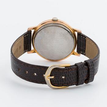 AN UNIVERSAL POLEROUTER WRISTWATCH, Geneva, 35 mm.