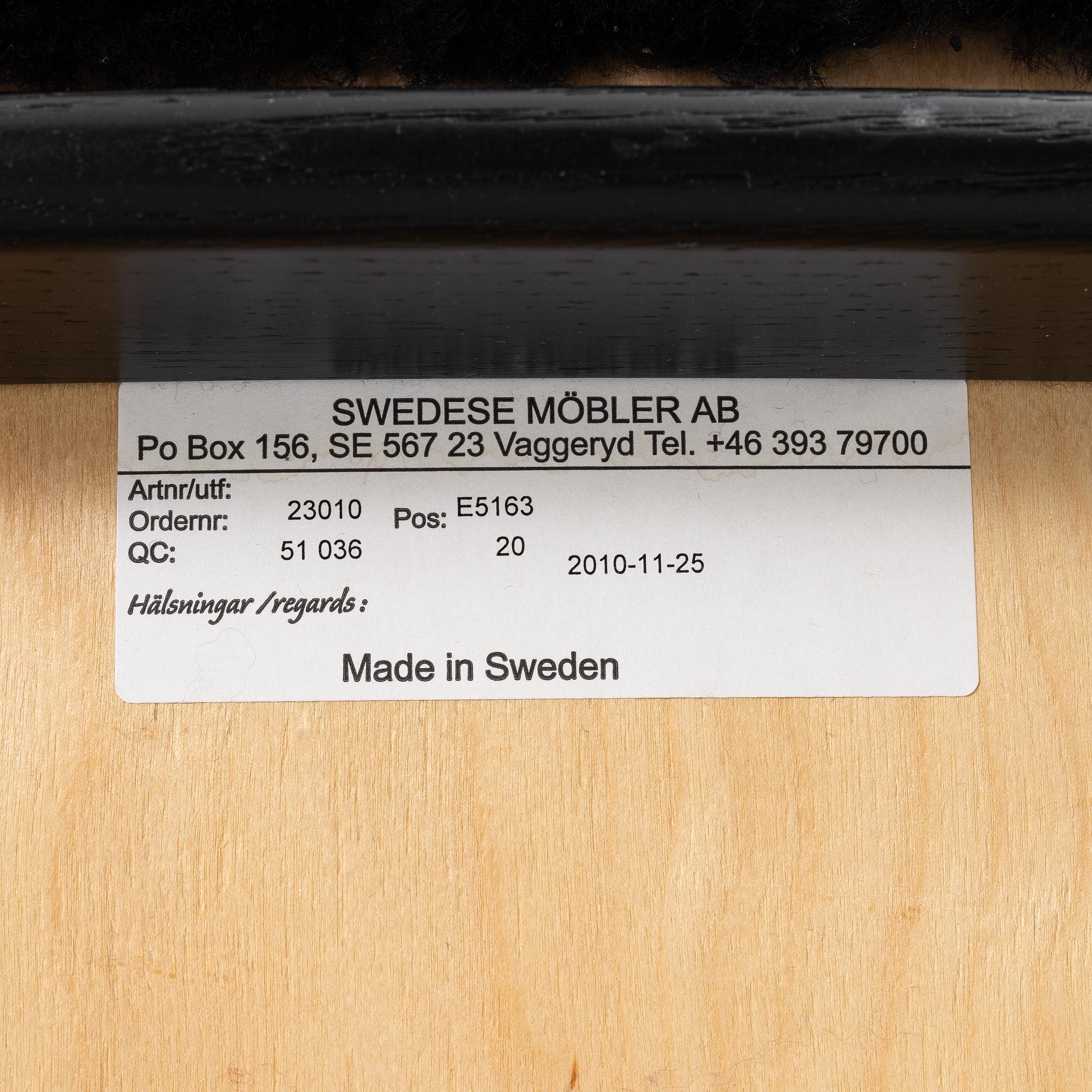 Yngve Ekström, a 'Lamino' easy chair with foot stool, Swedese 2010.