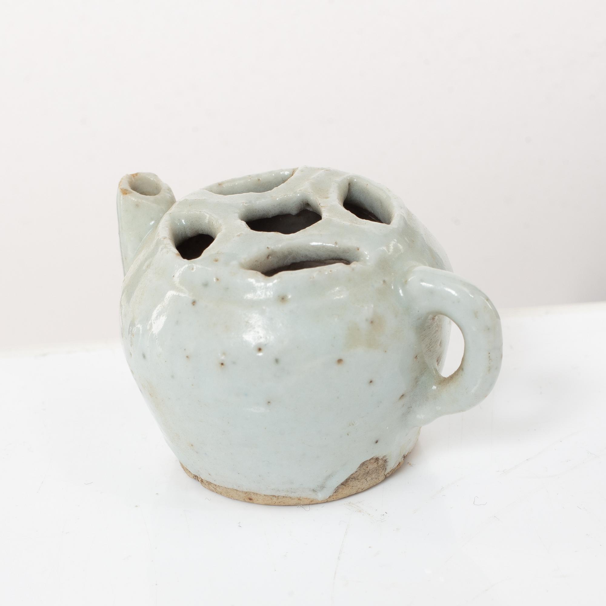 Two joss stick holders, a vase, a brush washer and a small ewer, Qing dynasty, 19th century and older.