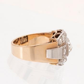 An 18K white and red gold ring set with rose cut diamonds.