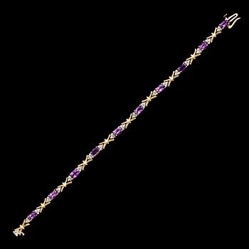 ARMBAND, 14 k guld, diamanter tot ca 0.90 ct, 10 ametister. Total vikt ca 12 g.