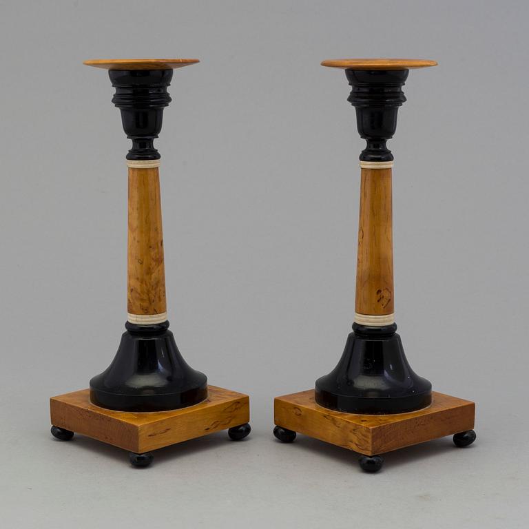A pair of birch candles by Karl A Axelsson, konstsvarvare, Eksjö, 1907.